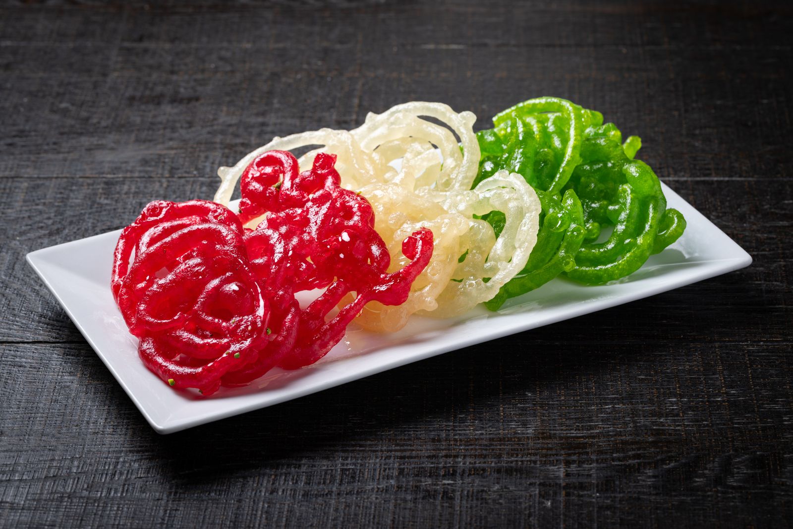 Red, white and green swirls of Mushabak Halabi